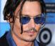 Johnny Depp, rebelle lors de l"avant-première hollywoodienne de "Public Enemies", au Mann"s Village Theatre de Westwood, à Los Angeles, le 23 juin 2009 !