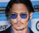Johnny Depp, lors de l"avant-première hollywoodienne de "Public Enemies", au Mann"s Village Theatre de Westwood, à Los Angeles, le 23 juin 2009 !