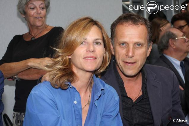 Virginie Clerc et Charles Berling au défilé Cerruti. 26/06/09