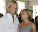 Claire Chazal et son compagnon Arnaud Lemaire au défilé Christian Dior lors de la Fashion Week parisienne, le 6 juillet 2009
