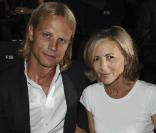 Claire Chazal et son compagnon Arnaud Lemaire au défilé Giorgio Armani lors de la Fashion Week parisienne, le 7 juillet 2009