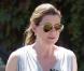 Ellen Pompeo ne sourit toujours pas... mais a enfin revêtu une jolie robe qui nous dévoile son ventre bien rebondi !