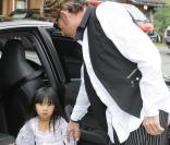 Johnny Hallyday avc sa fille Jade au cours du baptême de Joy à Gstaad en Suisse le 5 juillet 2009