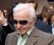 Charles Aznavour entre Drouot et Montmartre... toujours bien accompagné !