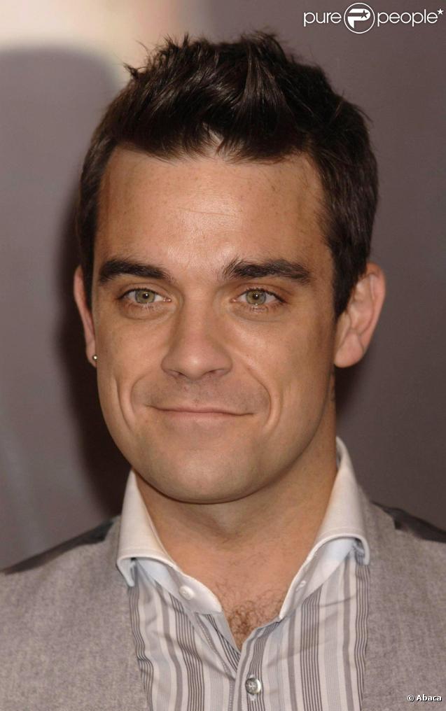 309708-robbie-williams-a-bien-change-il-se-637x0-1