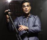 Robbie Williams a bien changé : il se voit déjà en père de famille !