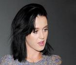 Katy Perry à la sortie du restaurant Mr Show à Los Angeles, accompagnée d'un garde du corps le 16 novembre 2009
