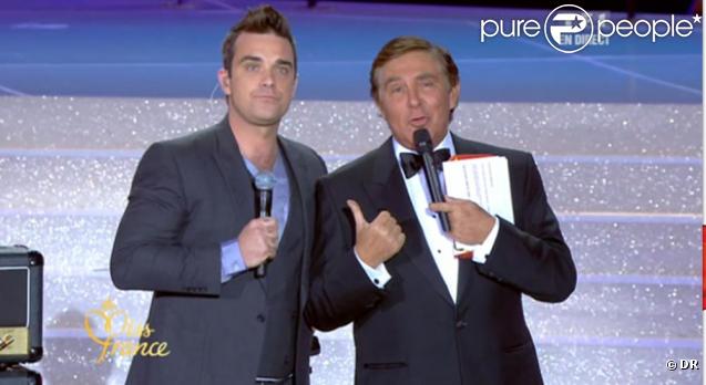 Même Jean-Pierre Foucault s'est montré séduit par le talentueux Robbie Williams : le showman a assuré pour sa prestation live !