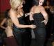 Cindy de Secret Story 3 ajuste le bustier de sa collection sur l'une de ses mannequins (21.01.10/ Paris)