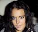 Lindsay Lohan souriante à la sortie d'un restaurant de Los Angeles, le 4 février 2010 !