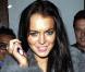 Lindsay Lohan souriante à la sortie d'un restaurant de Los Angeles, le 4 février 2010 !