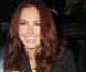 Hayden Panettiere, tout sourire, devant ses fans à qui elle signe des autographes avant d'aller au Château Marmont le 3 mars 2010