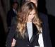 Blazer et robe grise, juchée sur de superbes sandales... Sarah Jessica est juste canon ! 