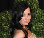 Demi Lovato est-elle tatouée ? Alors qu'elle est en vacances au Mexique, des clichés mettent le doute à Disney et font polémique.