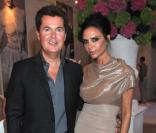 Simon Fuller et Victoria Beckham lors de la soirée de lancement du Range Rover Evoque, le 1er juillet à Londres