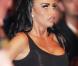 Katie Price lors du combat qui oppose son mari Alex Reid face à Tom Watson, à l'occasion du BAMMA 4, à Birmingham, le 25 septembre 2010