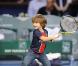 Michaël Llodra fête sa victoire contre Nikolai Davydenko en quart de finale du tournoi Paris-Bercy, en compagnie de son fils Téo, 3 ans, le 12novembre 2010