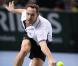 Michaël Llodra fête sa victoire contre Nikolai Davydenko en quart de finale du tournoi Paris-Bercy, en compagnie de son fils Téo, 3 ans, le 12novembre 2010