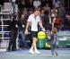 Michaël Llodra fête sa victoire contre Nikolai Davydenko en quart de finale du tournoi Paris-Bercy, en compagnie de son fils Téo, 3 ans, le 12novembre 2010