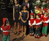 Barack et Michelle Obama ont reçu Mariah Carey pour le concert de Noël de Washington le 12 décembre 2010