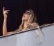 Gisele Bündchen et son mari Tom Brady font la fête et s'embrassent lors du Carnaval de Rio, le 6 mars 2011