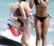 Lilly Becker et son fils Amadeus, en compagnie de la nounou sur la plage à Miami le 8 mars 2011