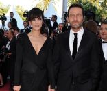 Gilles Lellouche et Mélanie Doutey amoureux à la projection de The Artist, le 15 mai 2011. 64e festival de Cannes<br />