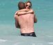 Plutôt que de prendre part aux qualifs pour l'Euro 2012 avec la Mannschaft, Bastian Schweinsteiger soigne son orteil cassé à Miami, avec sa divine chérie le mannequin Sarah Brandner. Le 2 juin 2011, même programme que la veille : promenade les pieds dans l'eau et baignade, seul le bikini a changé !