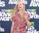 Elle Fanning dans une combishort fleurie signée D&G, la ligne plus jeune de Dolce & Gabbana