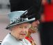 La reine Elizabeth II et son mari le duc d'Edimbourg Philip quittent le palais de Buckingham à Londres pour un défilé à cheval avant de se rendre à l'anniversaire de la reine le 11 juin 2011
