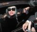 Lady Gaga à la sortie des studios de Canal , en route pour rejoindre le 1515 où l'attendent ses fans, à Paris, le 15 juin 2011.