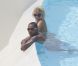 Theo Walcott et sa compagne Melanie Slade semblent bien profiter de leurs vacances dans le Sud de la France le 24 juin 2011