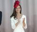 Kate Middleton dans une robe Reiss qu'elle n'a pas hésité à porter de nouveau. Cette robe d'un blanc immaculé était la pièce qu'elle portait sur la photo officielle de ses fiançailles.