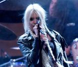 La chanteuse des Pretty Reckless Taylor Momsen, 18 ans, tient son rang de rockstar en arborant un look des plus trash. Madrid, le 7 juillet 2011. 