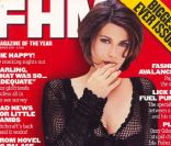 L\'actrice Teri Hatcher en lingerie fine et robe en maille pour le magazine FHM. Décembre 1997.