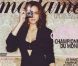 Marion Cotillard, en lingerie et blazer noirs, un appareil photo à la main, pour Madame Figaro. Février 2009. 