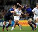 Le remuant Tuilagi a été bien pris par la défense française, ici Rougerie et Harinordoquy. Le XV de France a su se transcender et retrouver les valeurs du combat pour dominer (19-12) le XV de la Rose le 8 octobre 2011 et accéder aux demi-finales du Mondial de rugby 2011.