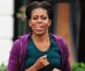 Michelle Obama devant la Maison Blanche à Washington, participe au grand rassemblement sportif de sauts pour entrer dans les Guinness des records. Le 11 octobre 2011