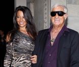 Barbara Gandolfi et Jean-Paul Belmondo lors du défilé de Roberto Cavalli  à Milan dans le cadre de la fashion week printemps-été 2012, le 26  septembre 2011