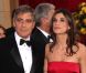 Elisabetta Canalis et George Clooney aux Oscars en mars 2010 à Los Angeles