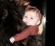 La petite Harper dans les bras de sa maman Victoria Beckham à New York le 16 novembre 2011