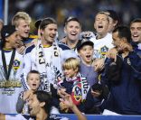 David Beckham et ses enfants Brooklyn, Romeo et Cruz le 20 novembre 2011 lors de la finale de MLS au Home Depot Center de Carson à Los Angeles