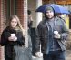 Hilary Duff et son époux Mike Comrie sous la pluie de Los Angeles, le dimanche 20 novembre 2011.