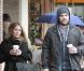Hilary Duff et son époux Mike Comrie sous la pluie de Los Angeles, le dimanche 20 novembre 2011.