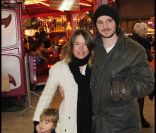Virginie de Clausade, son fils Mercutio, et son compagnon Dimitri à l'inauguration de Jours de fêtes au Grand Palais, à Paris, le 15 décembre 2011.
