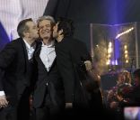 Patrick Fiori, Daniel Lavoie et Garou sur la scène de Bercy, le dimanche 18 décembre 2011.