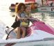 Rihanna fait du jet-ski avec une petite fille nommée Ali à la Barbade avec son petit frère le 29 décembre 2011