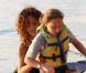 Rihanna fait du jet-ski avec une petite fille nommée Ali à la Barbade avec son petit frère le 29 décembre 2011