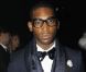 Le rappeur Tinie Tempah était sur son 31 au premier rang du défilé Lanvin automne-hiver 2012/2013 Paris, le 22 janvier 2012.