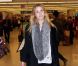 Whitney Port recharge son portable à l'aéroport de Miami, le 20 janvier 2012
